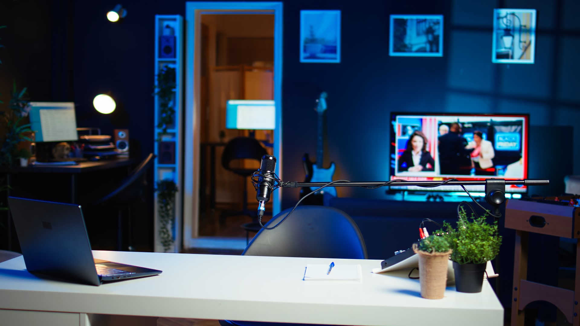 Dim lights and blue walls for a basement home office remodeling