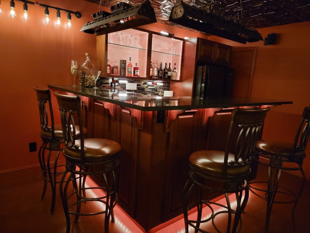 Custom speakeasy bar built during a basement remodel